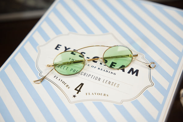 Voltaire - Gold with Green lenses